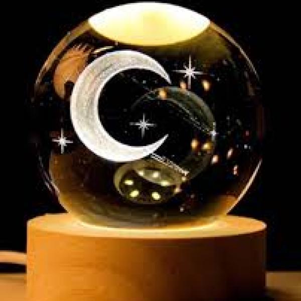 "كرات الكريستال" translates to **"crystal balls"** in English.